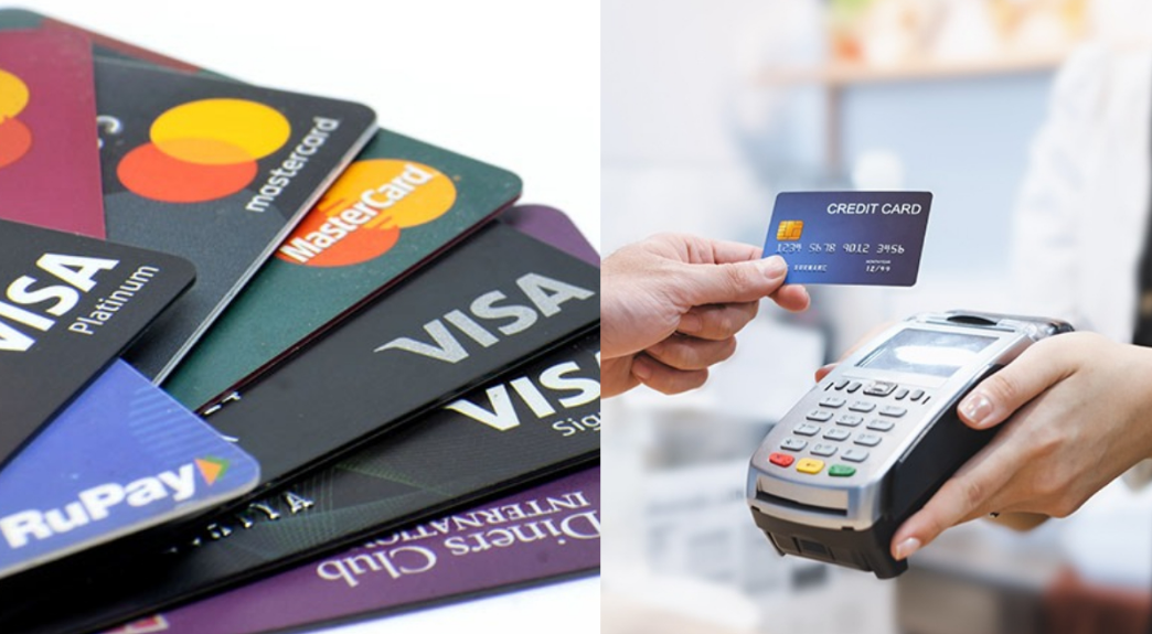 Person managing multiple credit card payments on a laptop